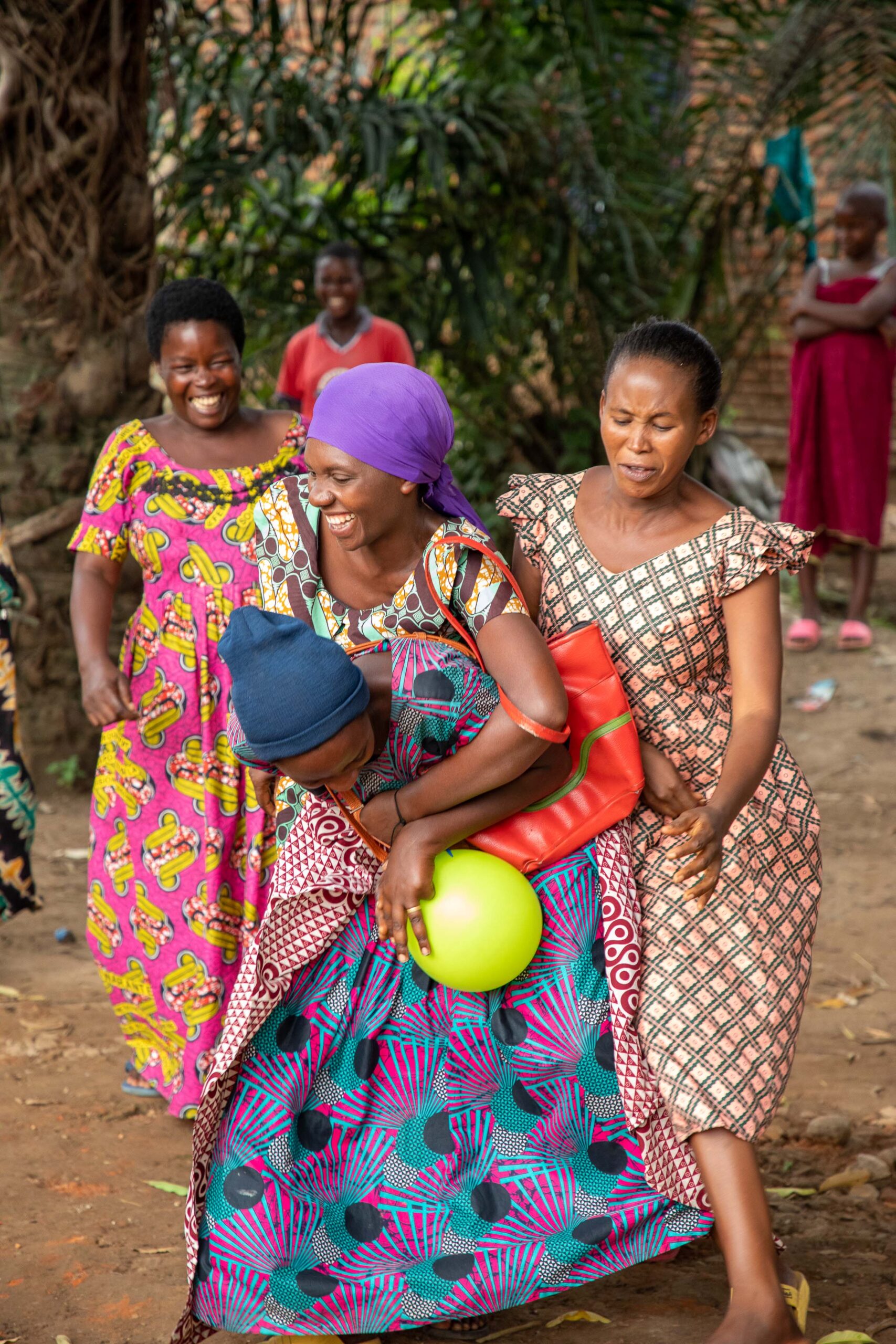A group of Burundian women playing with a balloon